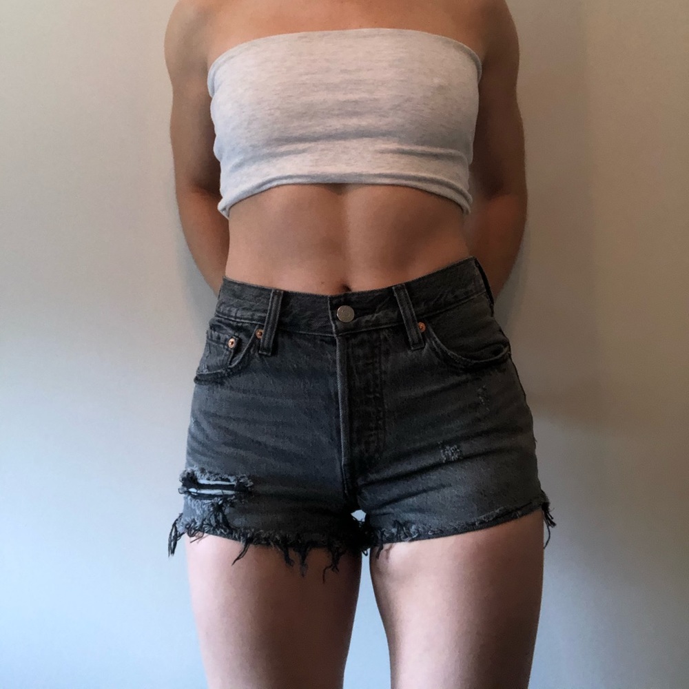 Frayed Levi’s 501 black denim shorts